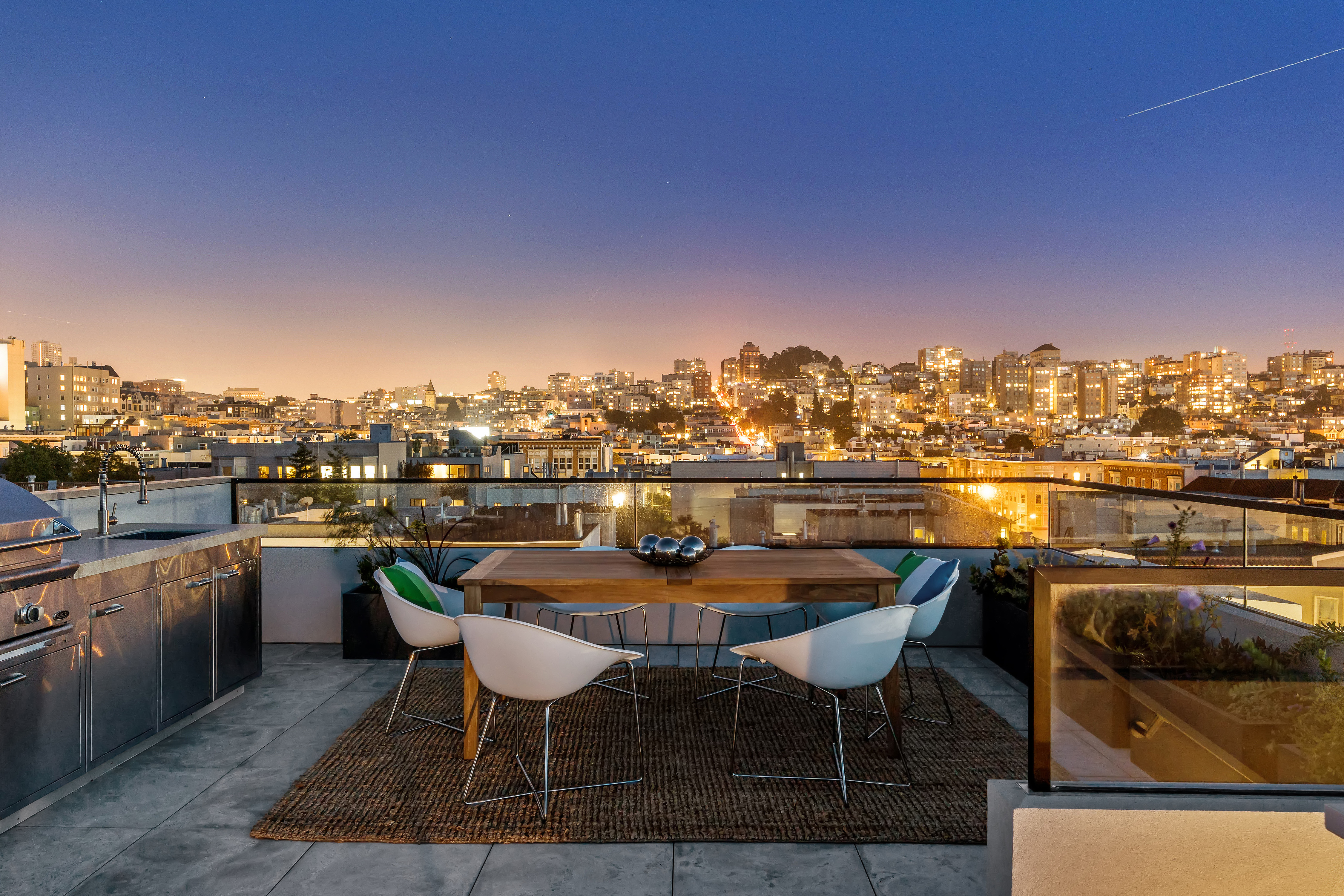 A gorgeous city view from the rooftop patio
