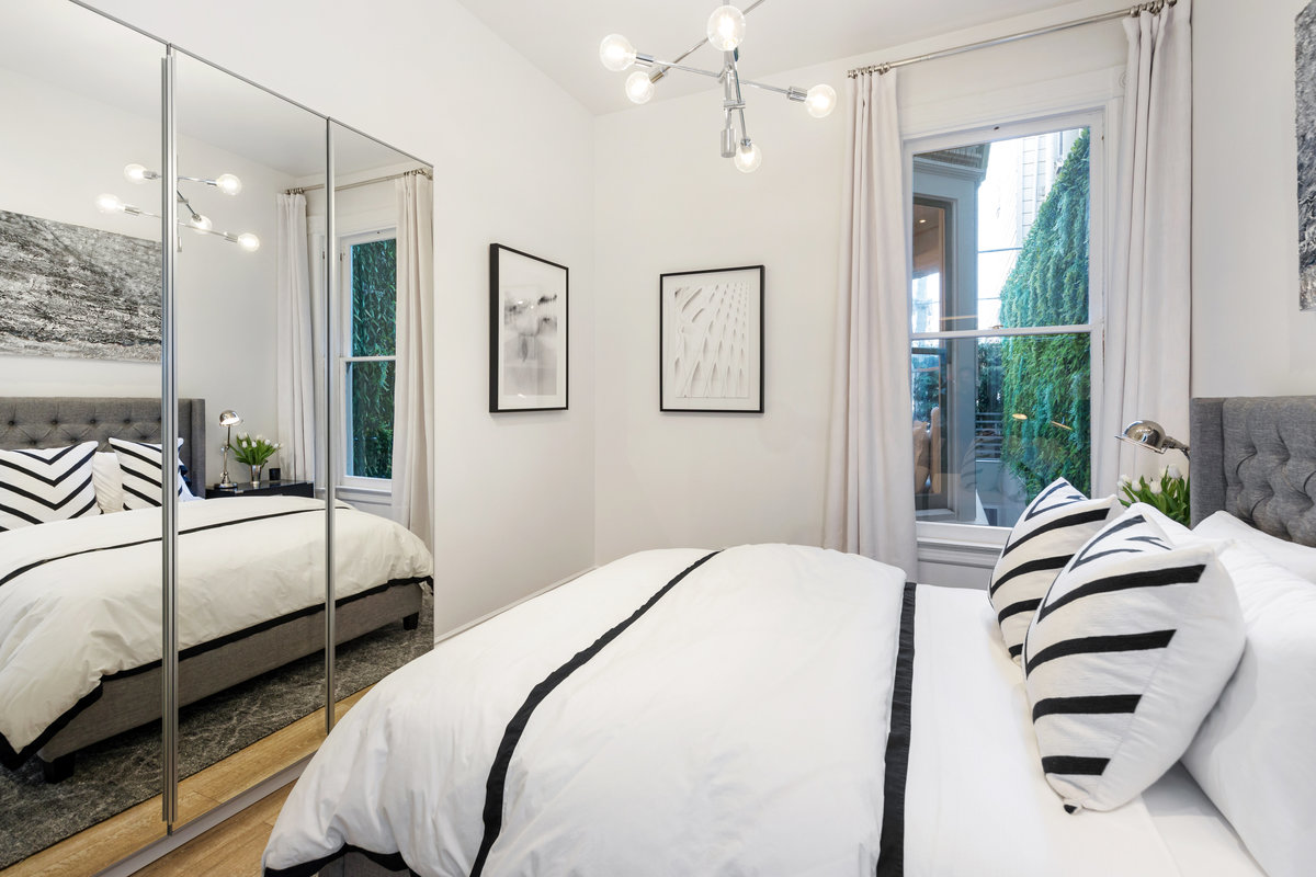 Bedroom #3/Guest with greenery lined patio outlook