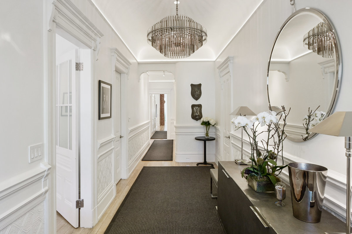 Entry Foyer; door to primary bedroom on left; great room at rear