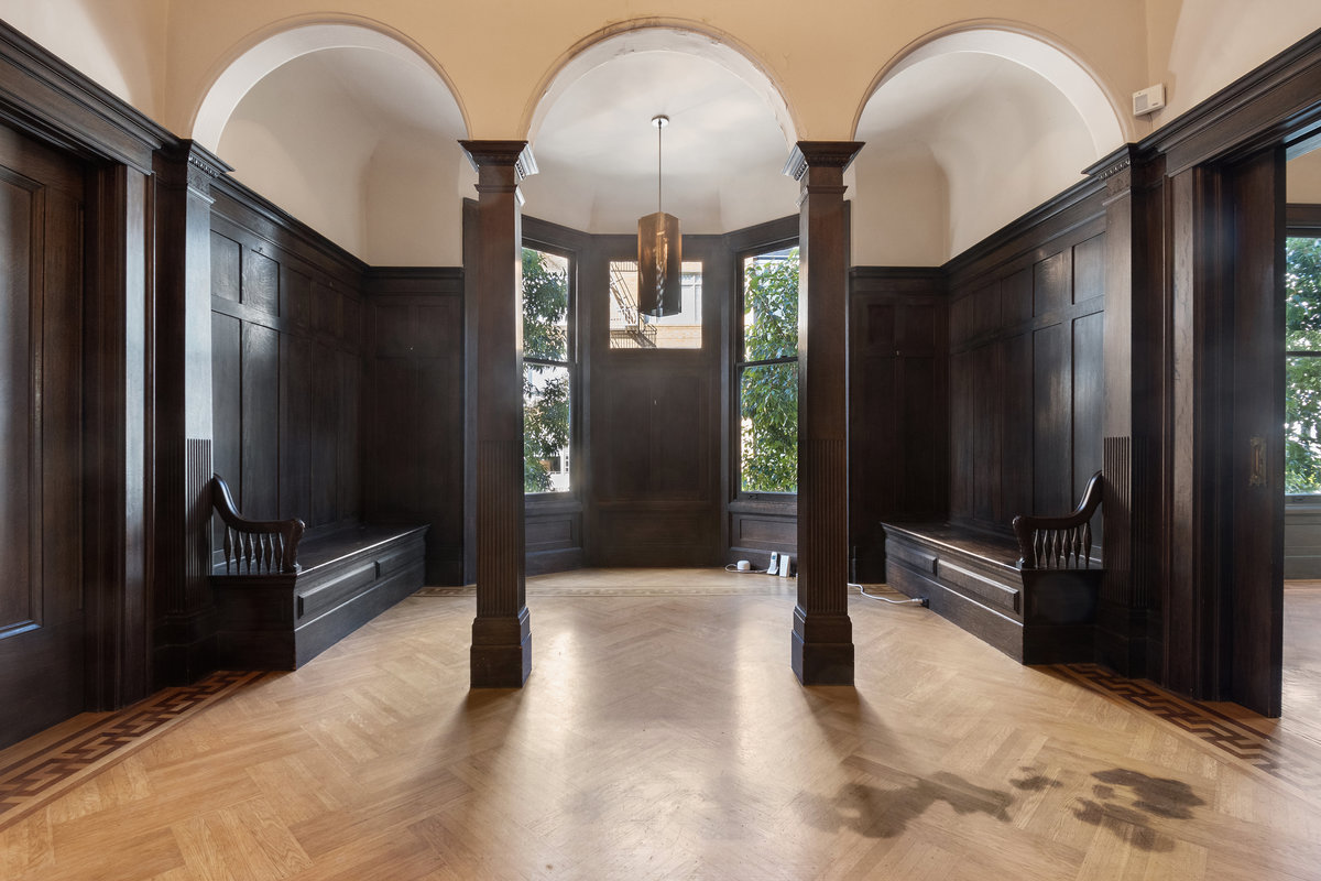 2nd level stately grand foyer flanked by living & dining rooms