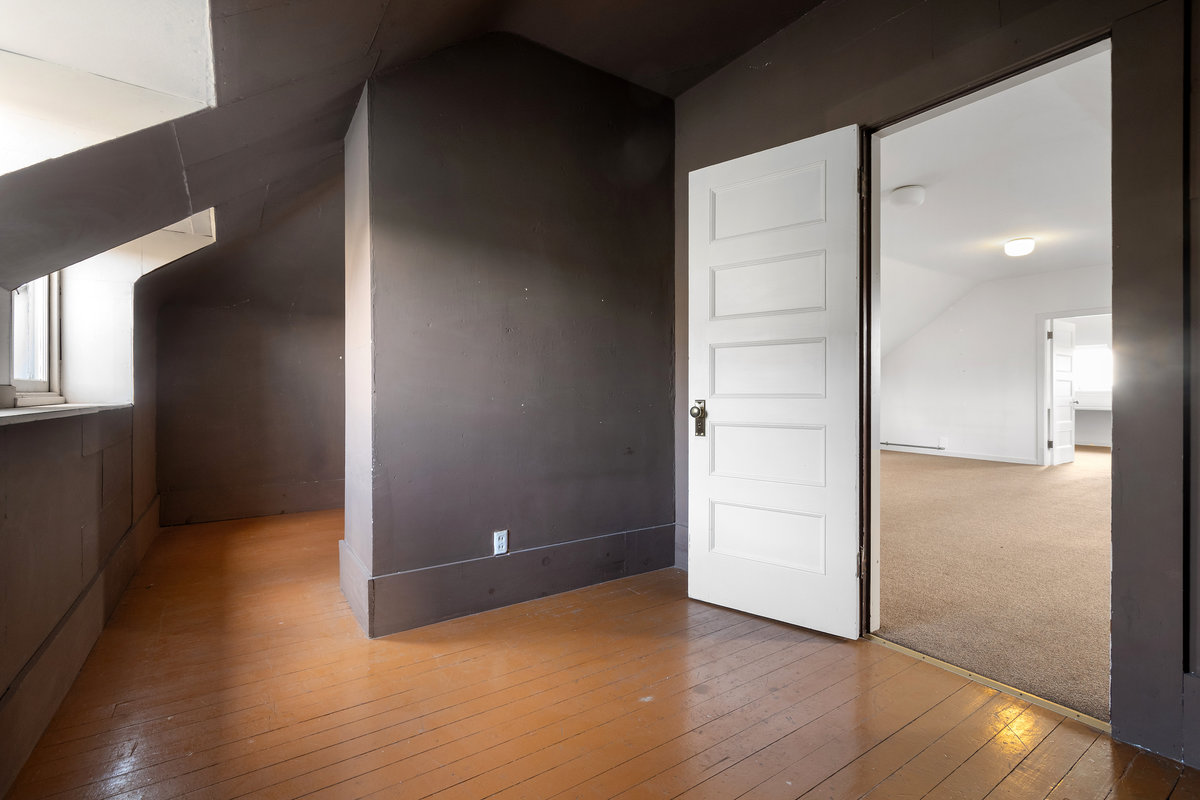 Walk-in closet off 4th level family room