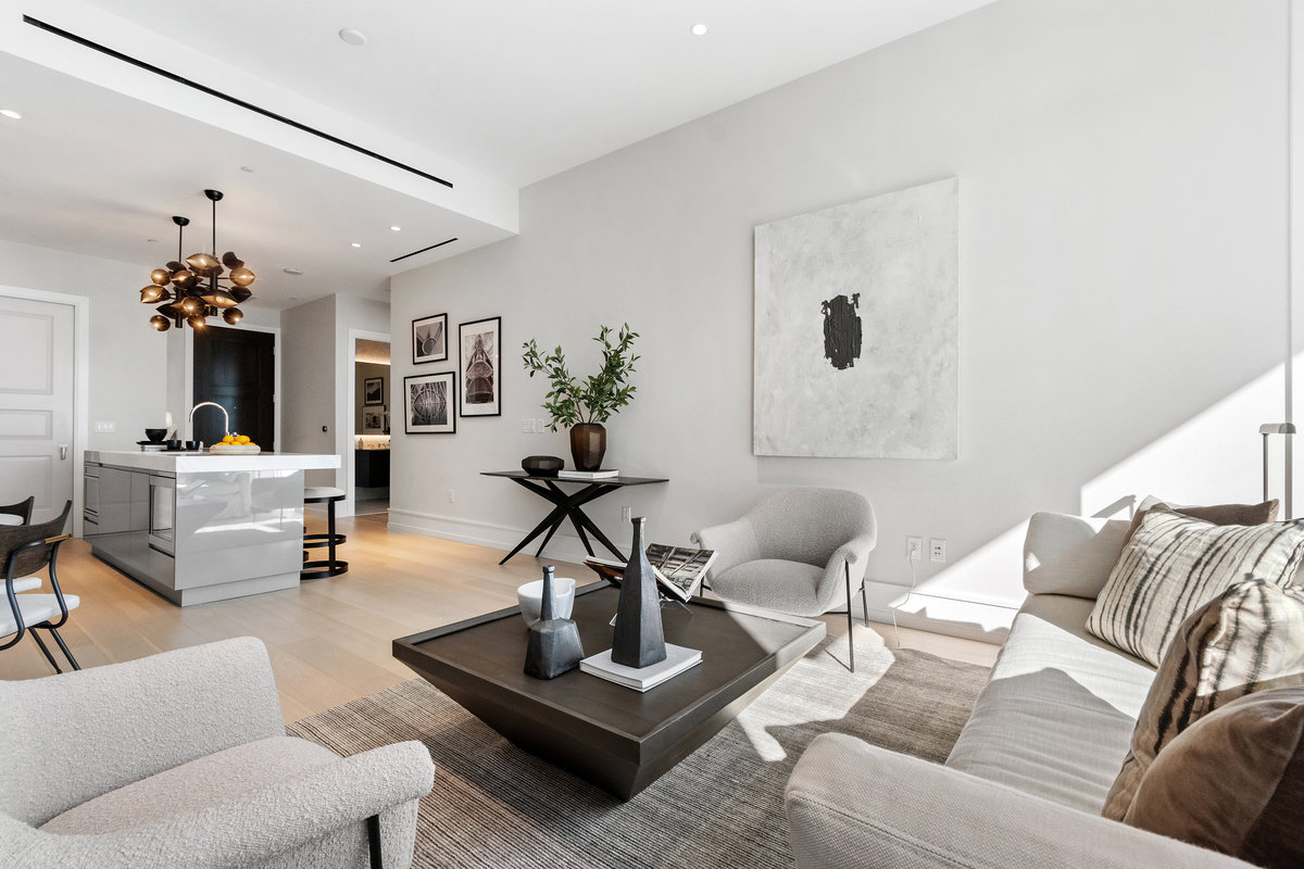Great room with door to powder room in far right of image