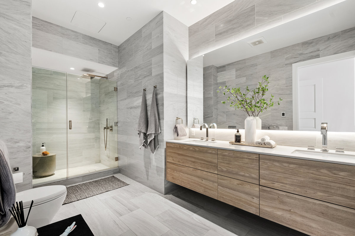Marble full bath with heated floor, dual sinks, shower